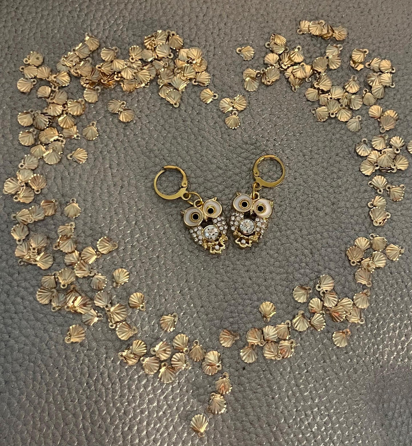 Adorable gold diamante owl earrings featuring sparkling embellishments, perfect for adding a whimsical touch to your jewelry collection and enhancing any outfit.