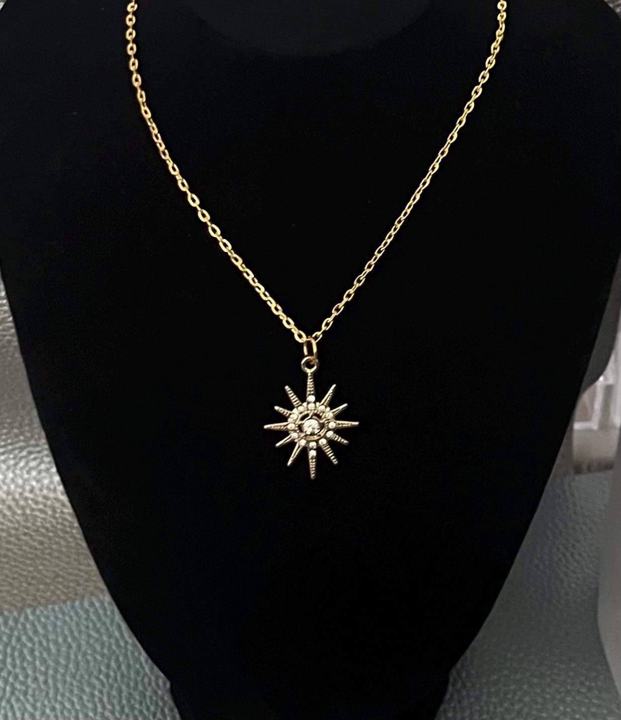 Gold Bright Star Diamante Necklace featuring sparkling rhinestones, ideal for adding a touch of glamour and elegance to any outfit for special occasions or everyday wear.
