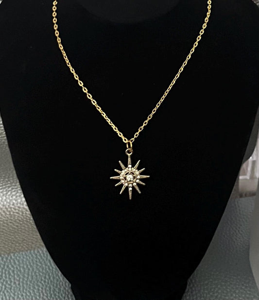 Gold Bright Star Diamante Necklace featuring sparkling rhinestones, ideal for adding a touch of glamour and elegance to any outfit for special occasions or everyday wear.