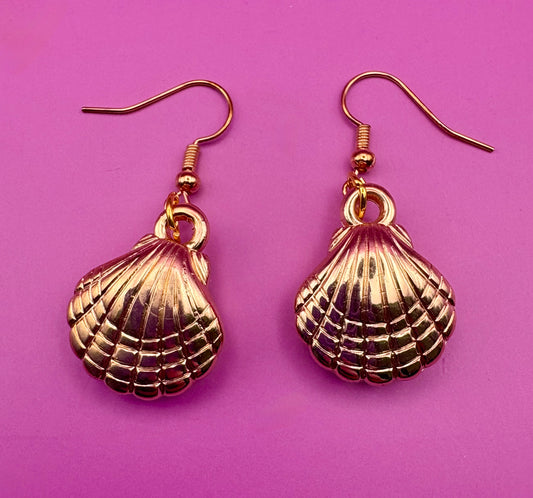 Stylish gold look seashell earrings, perfect for adding a touch of ocean-inspired elegance to your jewelry collection and enhancing any summer outfit.
