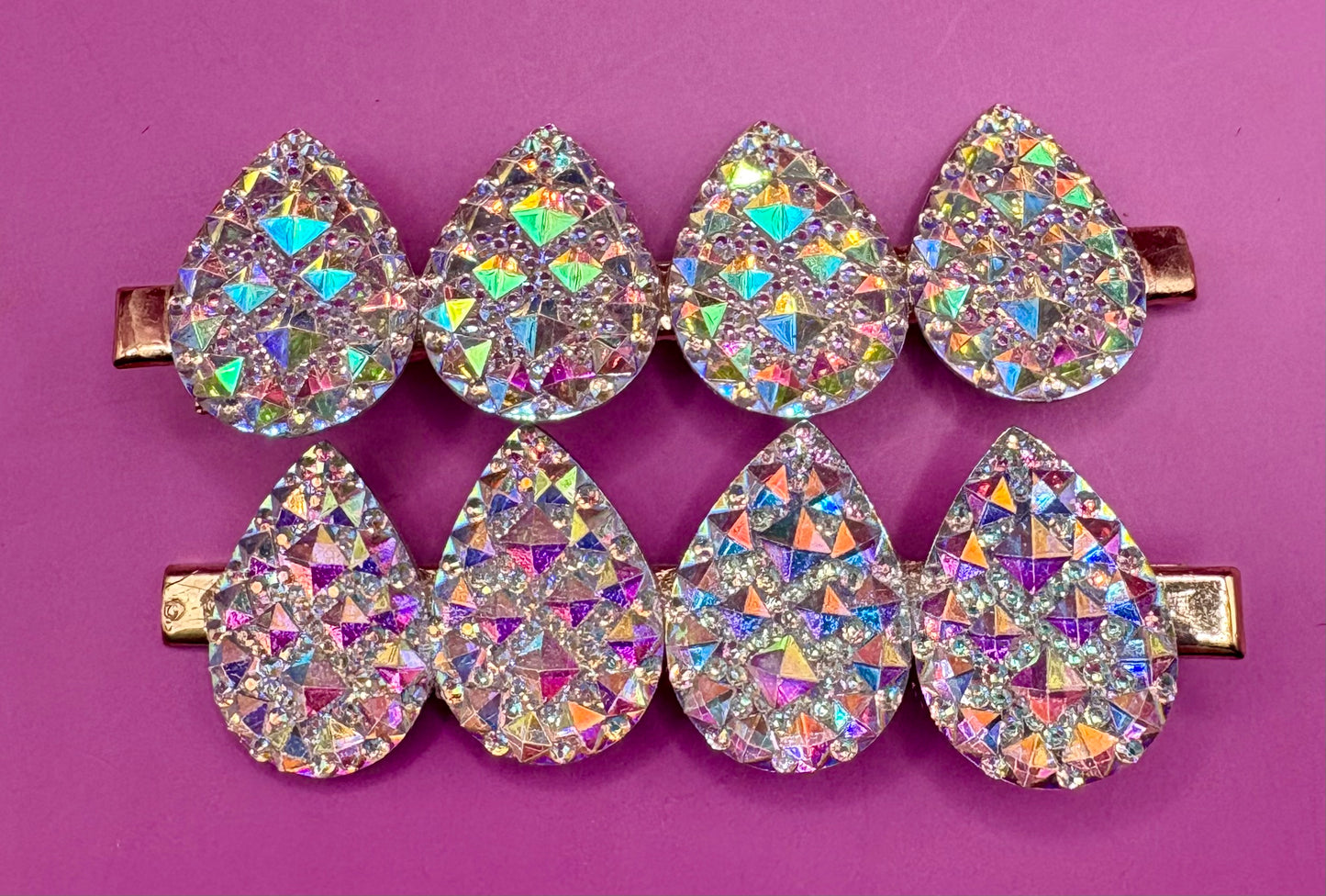 Stylish large circular heart teardrop glitter hair slide in silver, ideal for adding sparkle to festive hairstyles, sold in pairs, perfect for Christmas celebrations.