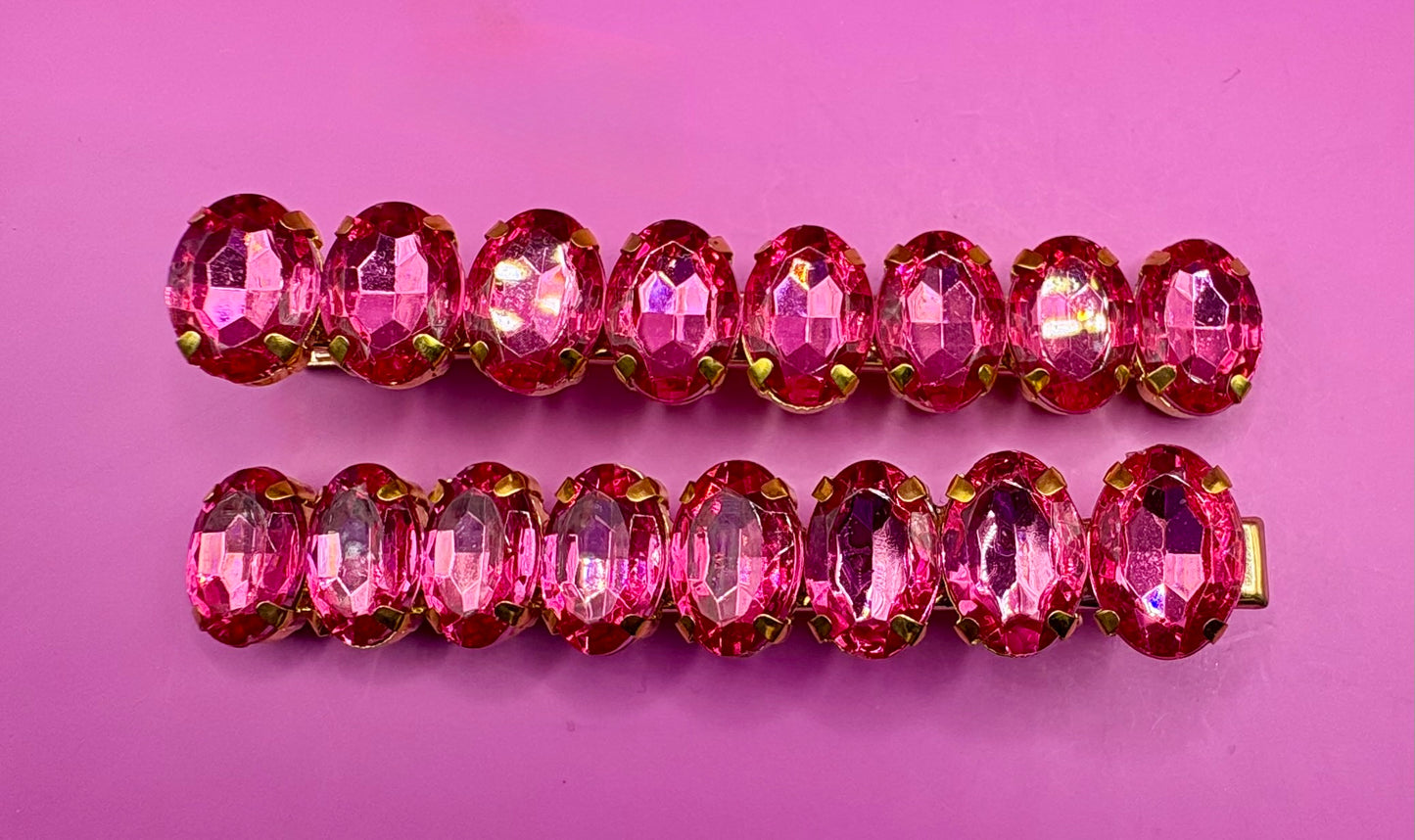 Stylish pair of large gemstone hair slides in vibrant colors, perfect for adding a fashionable touch to any hairstyle and enhancing your look.
