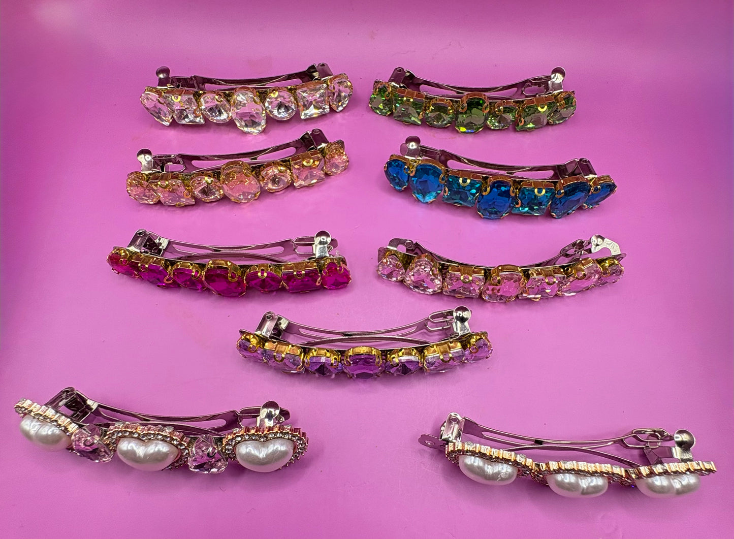 Eye-catching glass rhinestone statement prong clip for hair, perfect for elevating your hairstyle with glamorous sparkle and shine.