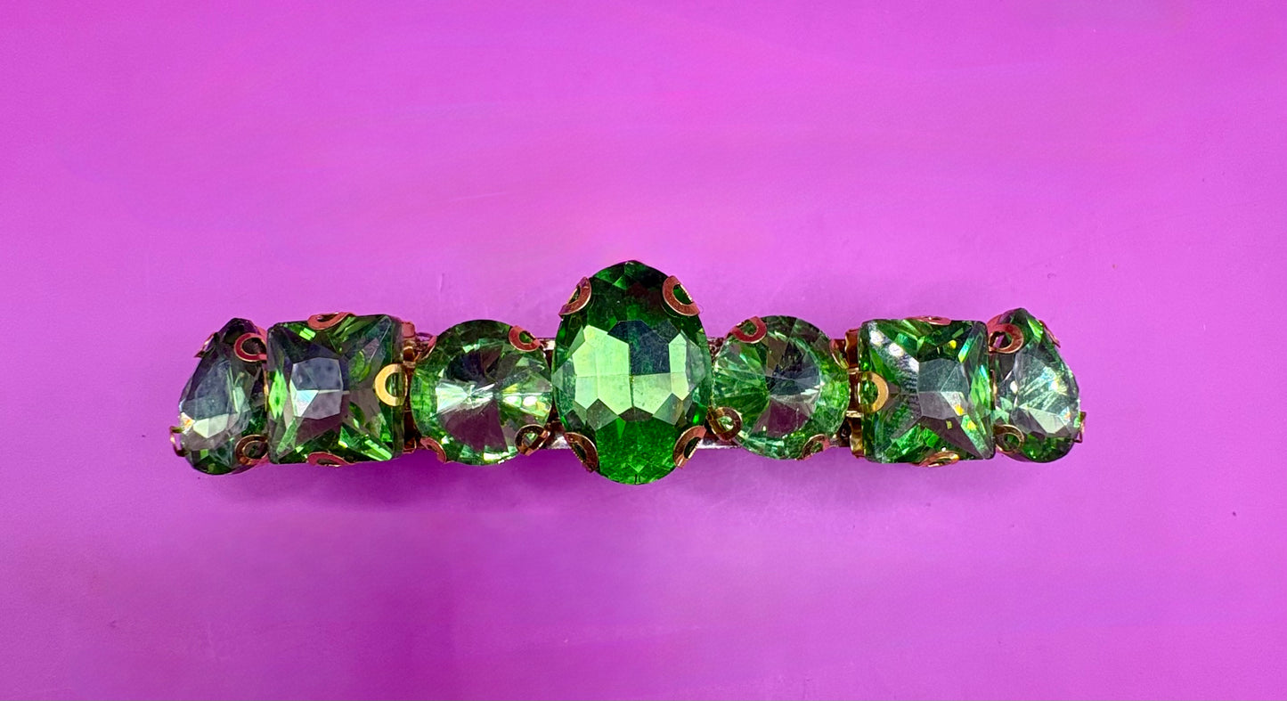 Eye-catching glass rhinestone statement prong clip for hair, perfect for elevating your hairstyle with glamorous sparkle and shine.