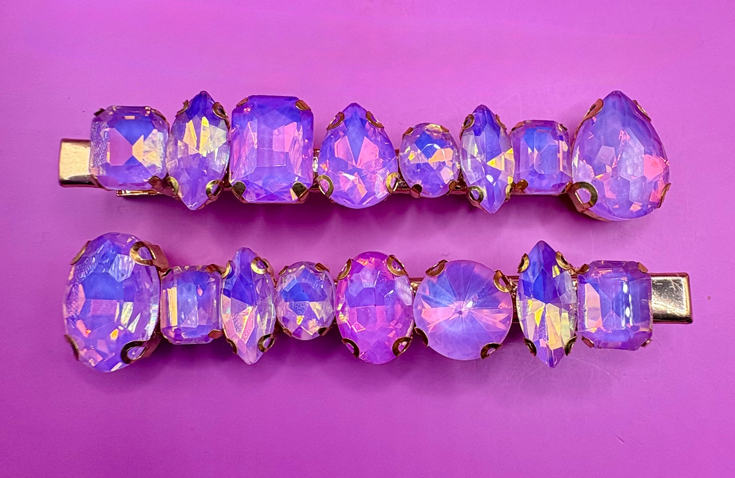 Stylish pair of large neon pastel gemstone hair slides designed for fashion-forward hairstyles, perfect for adding a statement touch to any look.