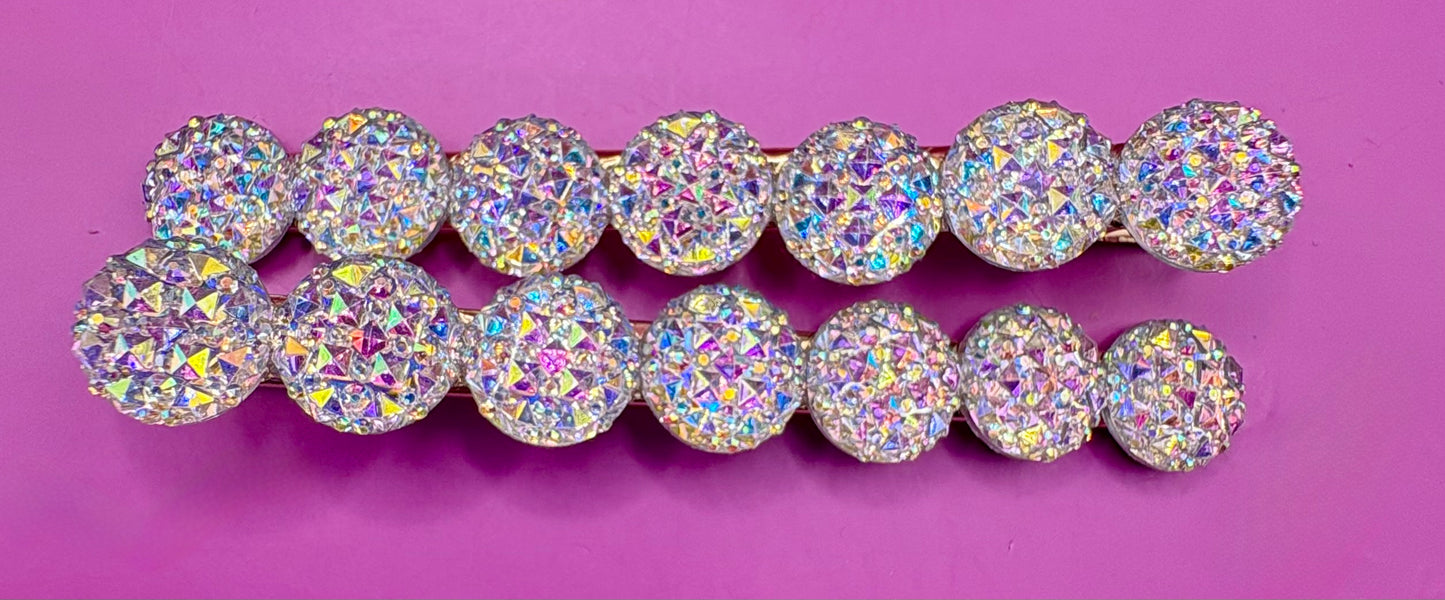 Chic large circular glitter heart hair clips, featuring a sparkly design and sold as a pair, ideal for Valentine's Day gifts and enhancing any hairstyle with a touch of glamour. available in multi colour, gold, turquois pink silver purple