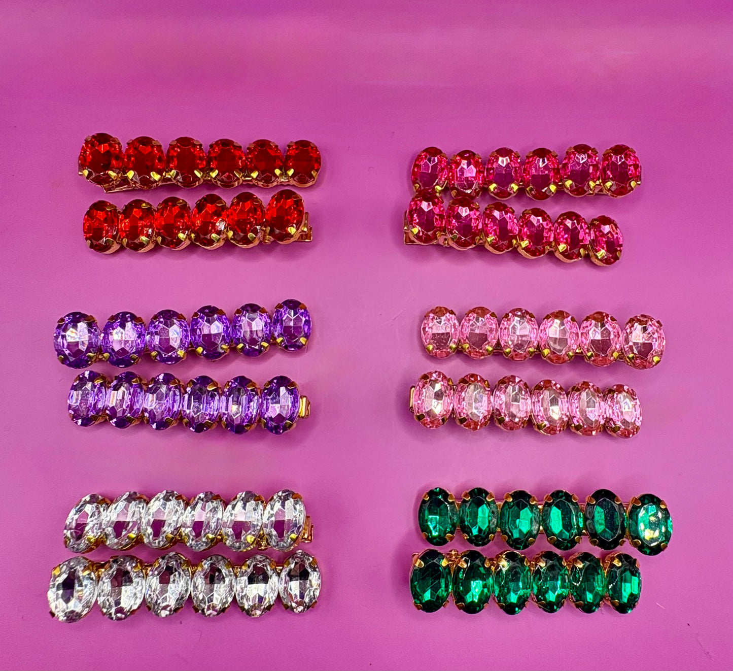 Elegant pair of 6cm gemstone hair slides featuring unique designs, ideal for enhancing hairstyles and adding a touch of glamour to any outfit.