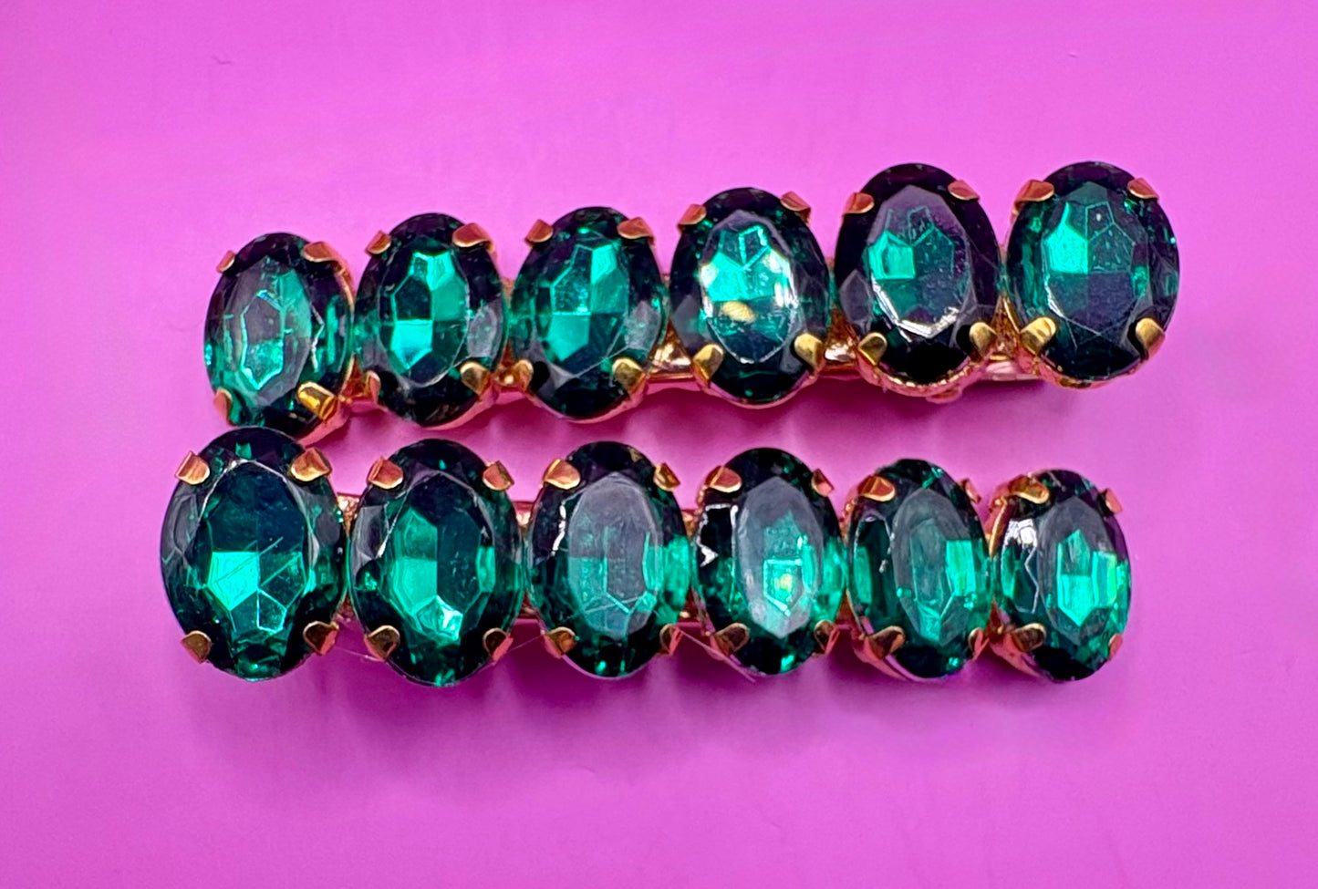 Elegant pair of 6cm gemstone hair slides featuring unique designs, ideal for enhancing hairstyles and adding a touch of glamour to any outfit.