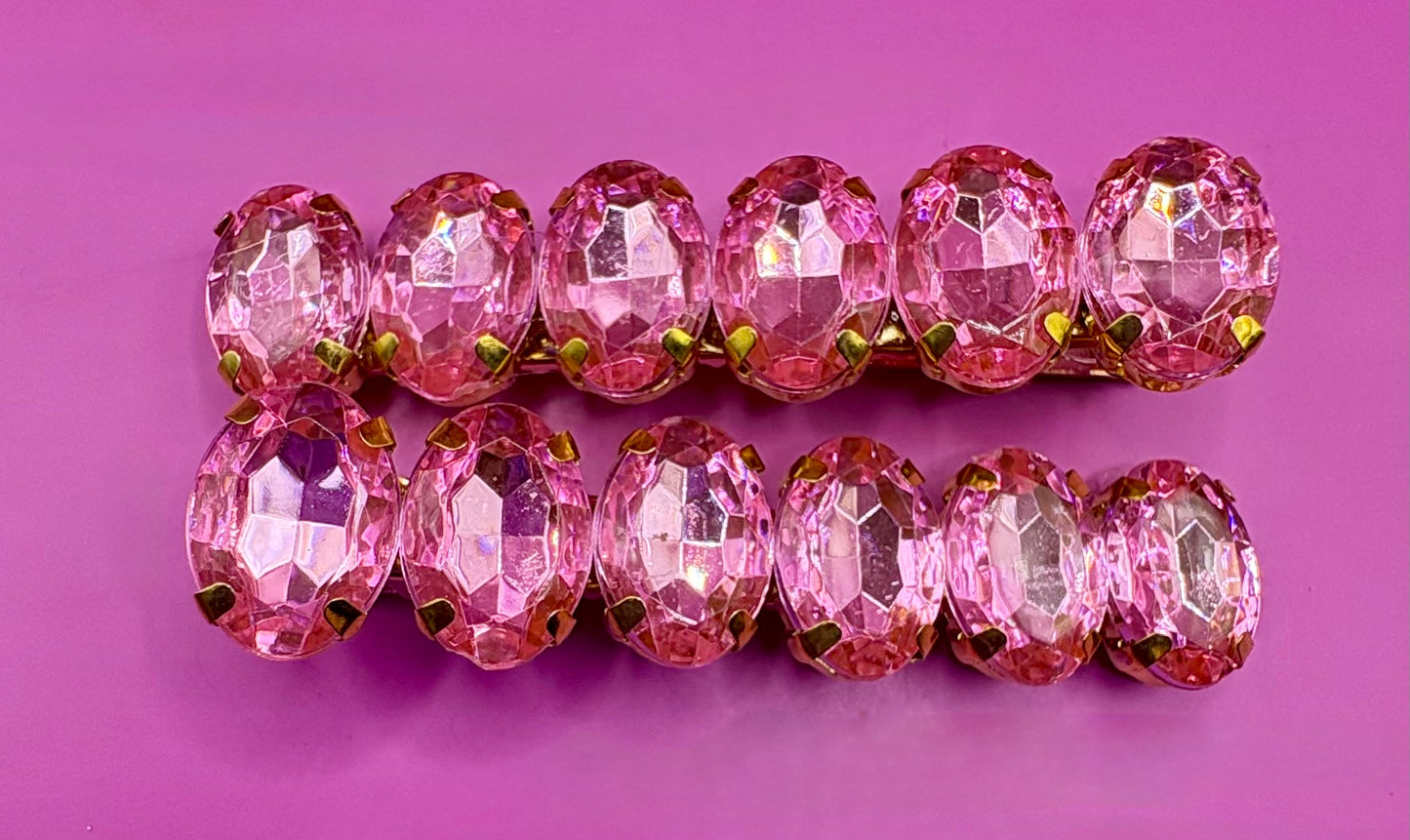Elegant pair of 6cm gemstone hair slides featuring unique designs, ideal for enhancing hairstyles and adding a touch of glamour to any outfit.