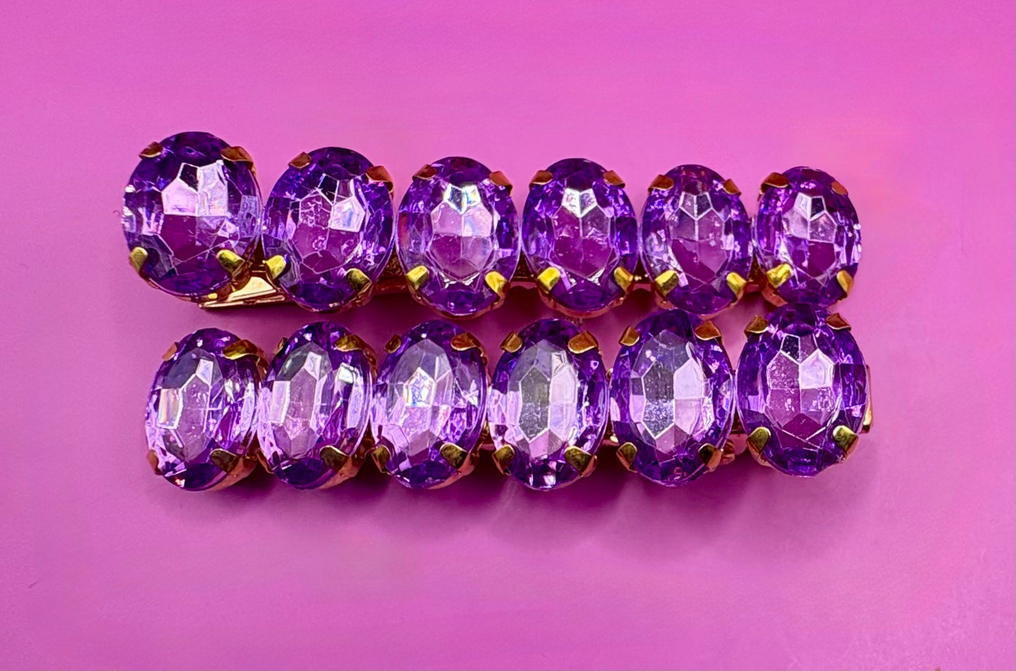Elegant pair of 6cm gemstone hair slides featuring unique designs, ideal for enhancing hairstyles and adding a touch of glamour to any outfit.