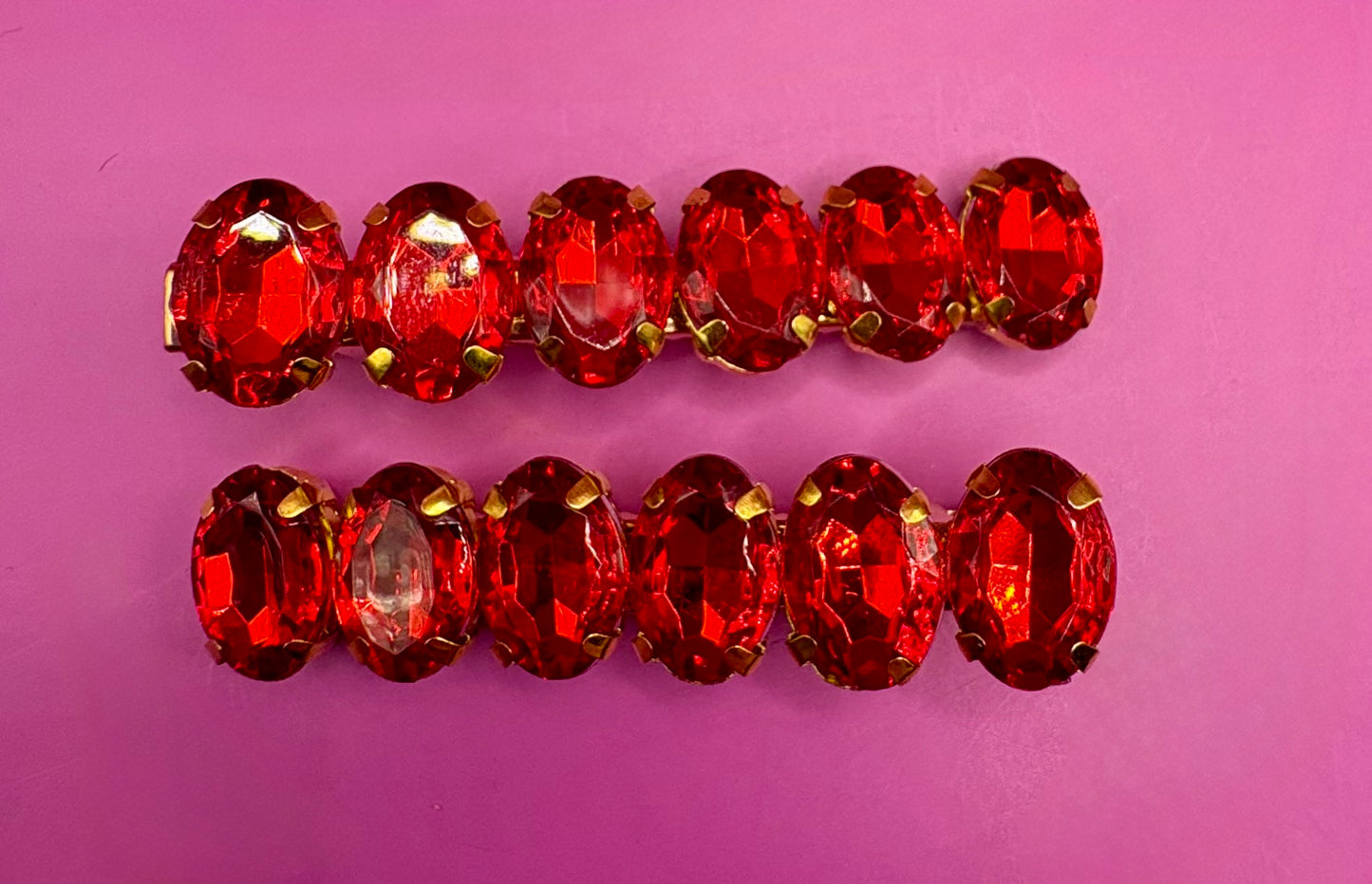 Elegant pair of 6cm gemstone hair slides featuring unique designs, ideal for enhancing hairstyles and adding a touch of glamour to any outfit.