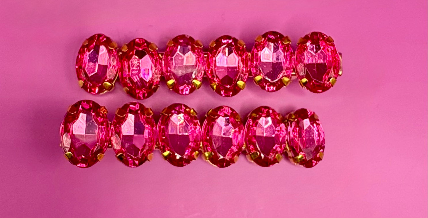 Elegant pair of 6cm gemstone hair slides featuring unique designs, ideal for enhancing hairstyles and adding a touch of glamour to any outfit.