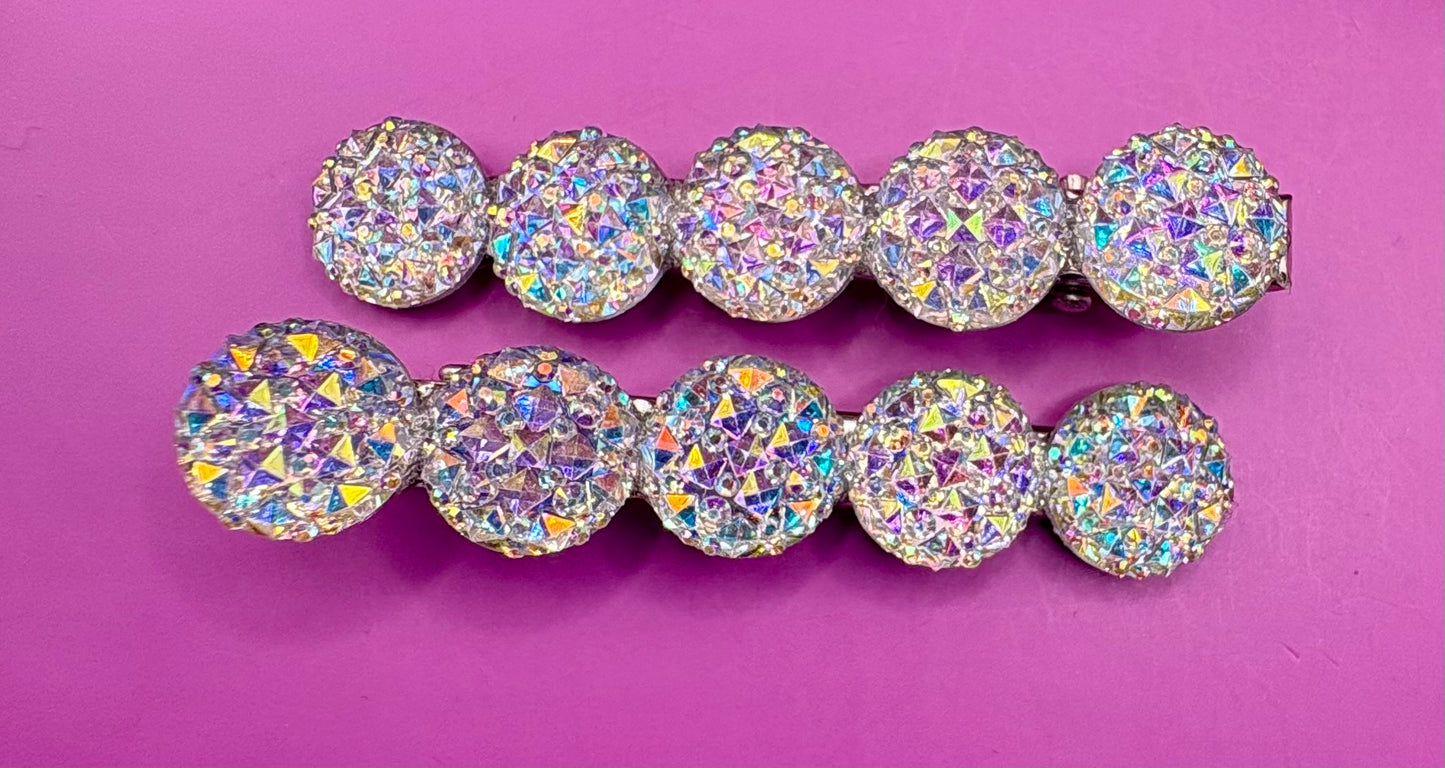 Chic circular glitter heart hair clips, featuring a sparkly design and sold as a pair, ideal for Valentine's Day gifts and enhancing any hairstyle with a touch of glamour. available in multi colour, gold, turquois pink silver purple