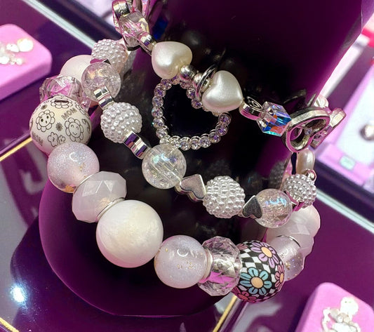 Colorful beaded bracelet on a purple surface