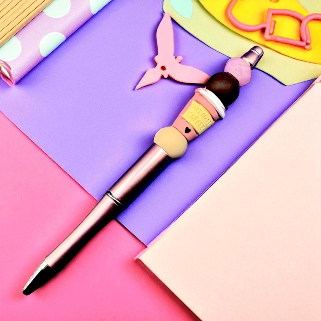 Colorful pen with cartoon character design on a multicolored background
