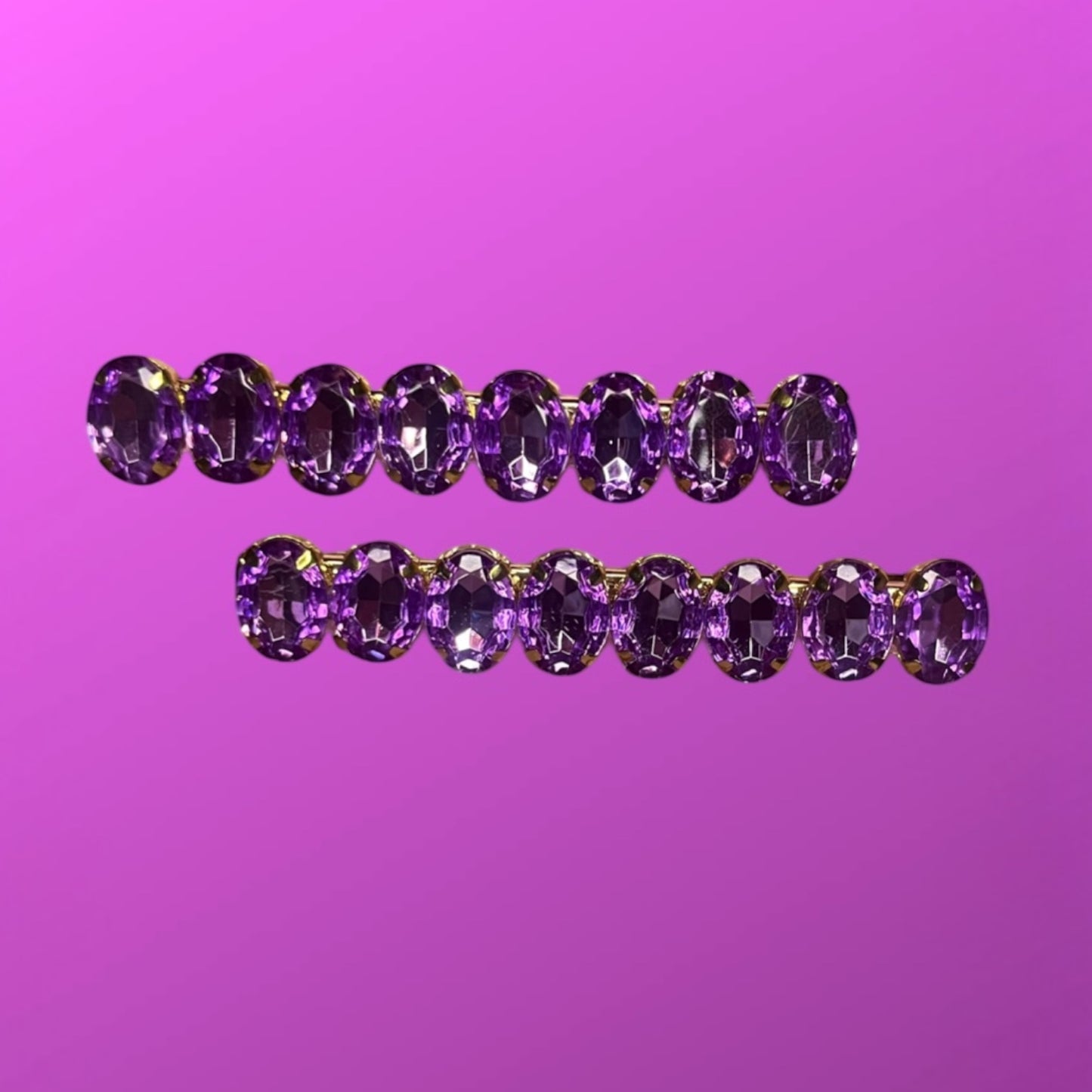 Stylish pair of large gemstone hair slides in vibrant colors, perfect for adding a fashionable touch to any hairstyle and enhancing your look.