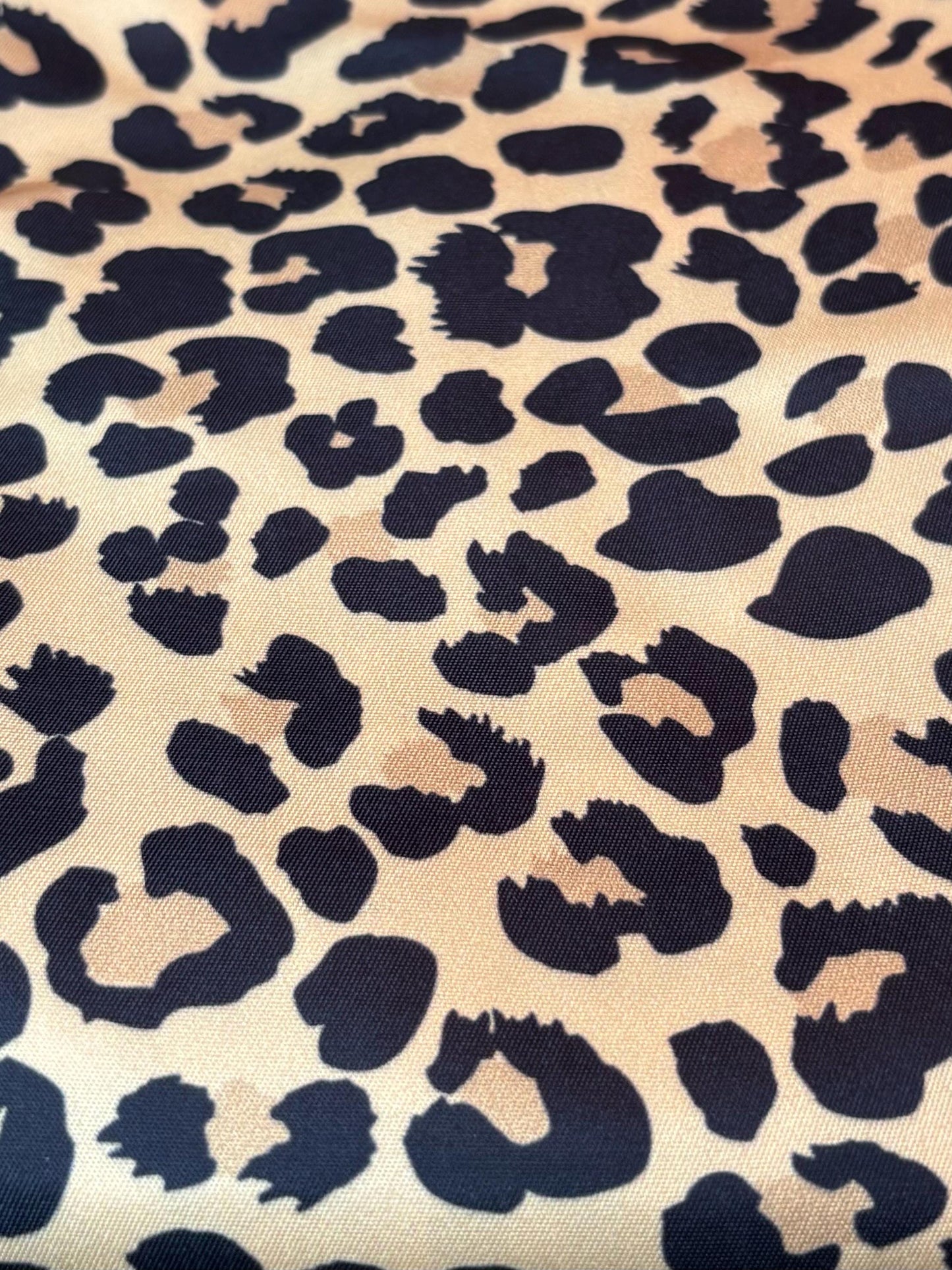 Handmade V-shaped pillowcase with various stylish prints, made of 100% polyester for a satin feel, designed to protect hair and enhance comfort while sleeping.