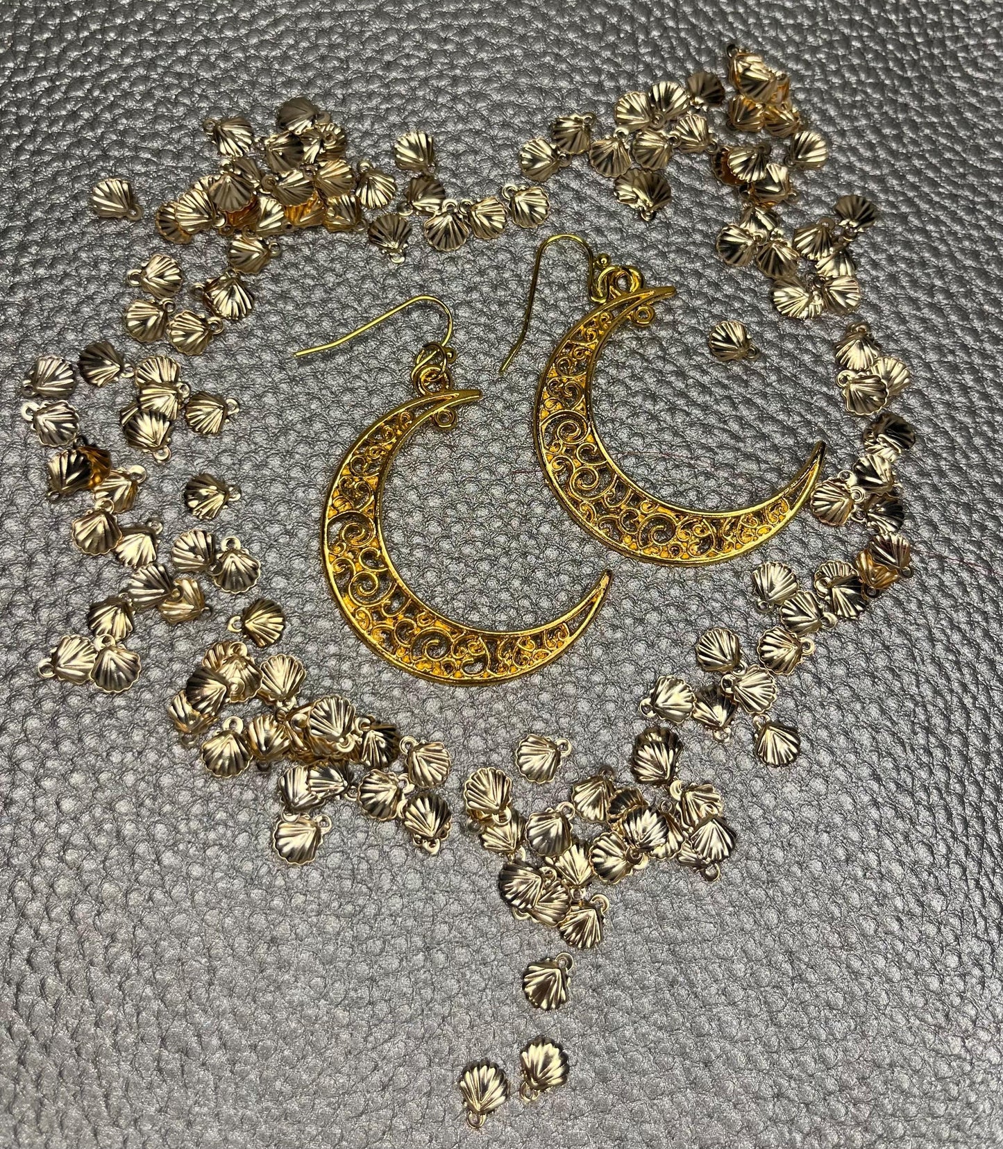 Stylish large moon earrings in gold and silver, perfect for adding a celestial touch to your jewelry collection and complementing any outfit.