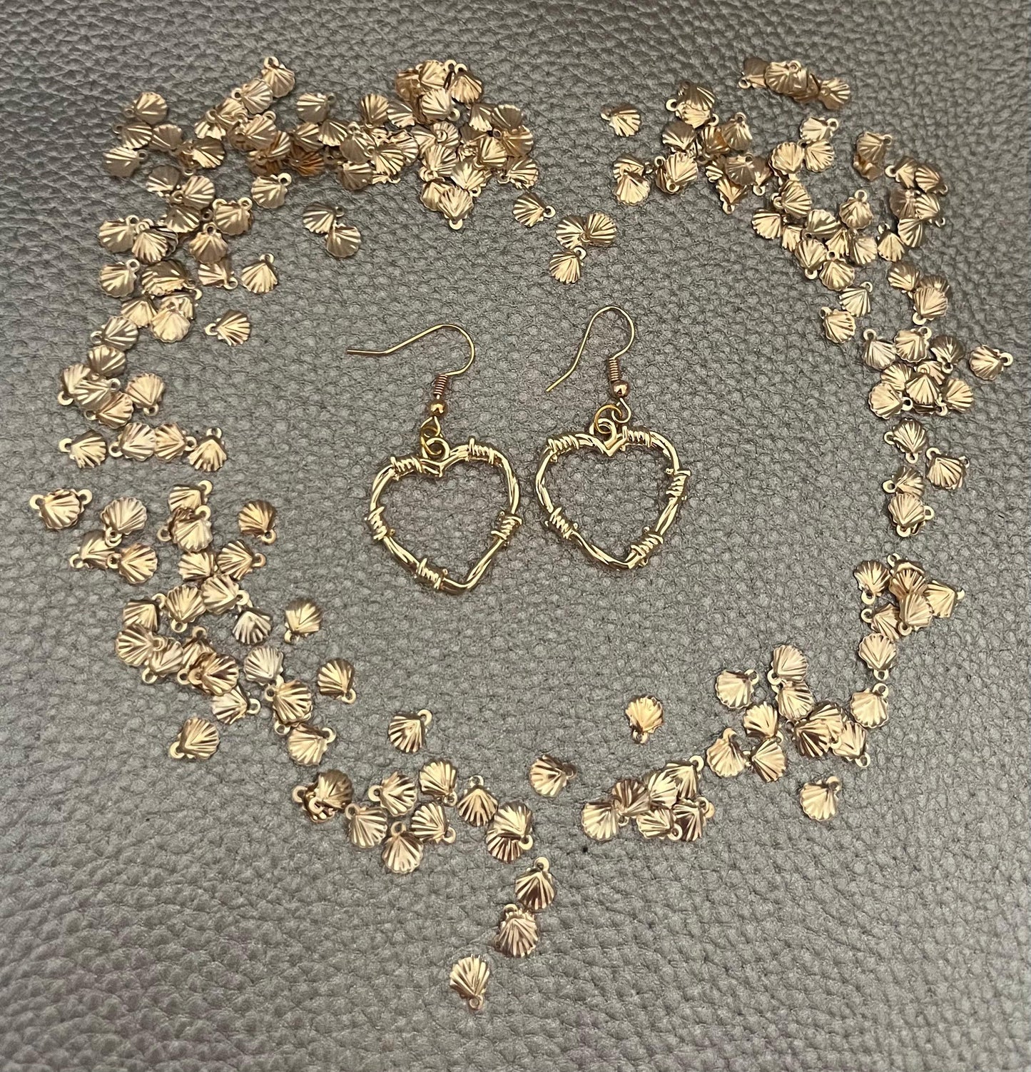 Stylish wire wrapped heart earrings, showcasing a unique design perfect for adding a romantic touch to any jewelry collection