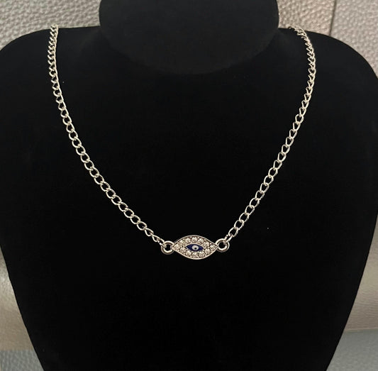Silver Evil Eye diamante necklace featuring a sparkling design for protection and elegance, perfect for everyday wear or special occasions.