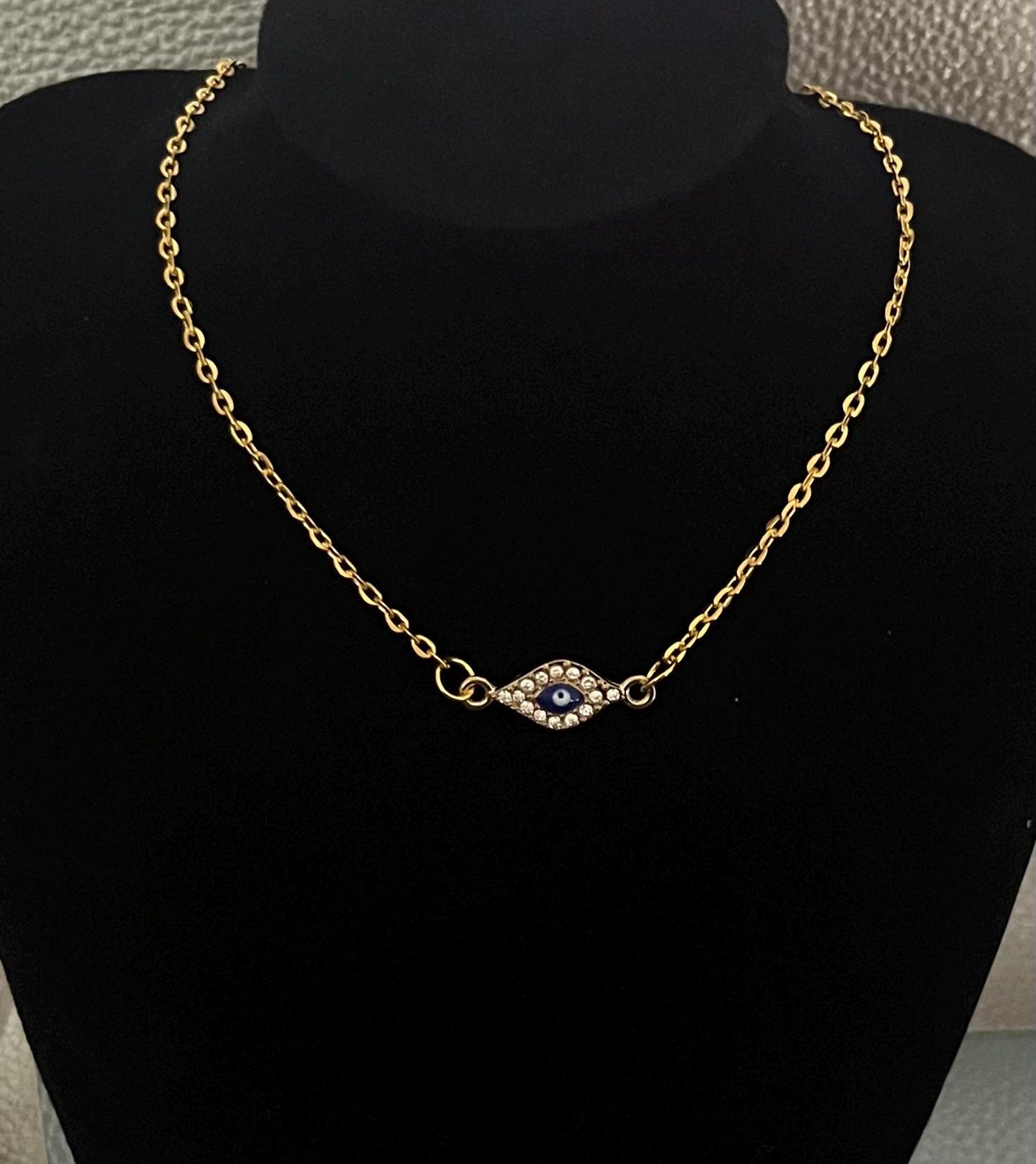 Diamante Small Evil Eye Pendant Necklace with vibrant color accents and shimmering details, designed for stylish protection and perfect for layering or everyday wear.