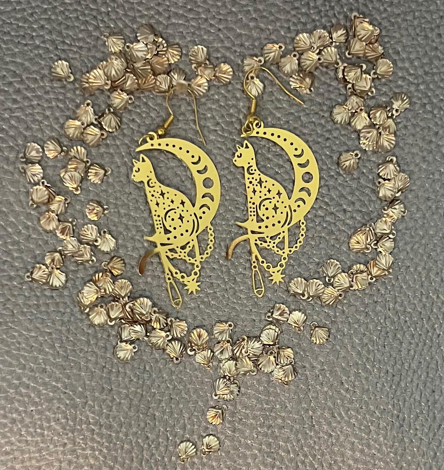 Charming cat on the moon earrings, featuring a whimsical design perfect for cat lovers, adding a playful touch to any outfit and ideal for casual or everyday wear.