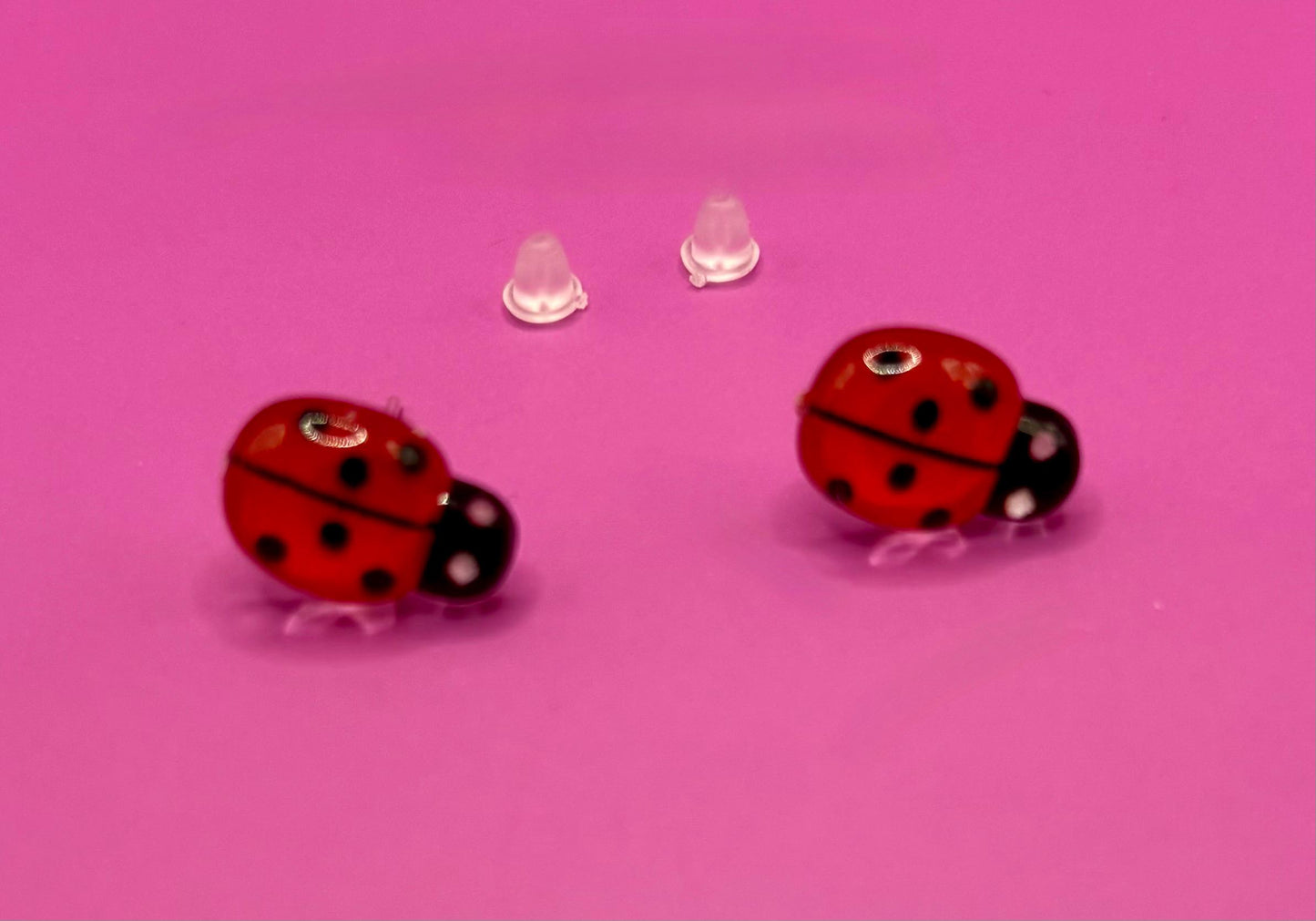 Whimsical red ladybug earrings with charming design, perfect for adding a playful touch to your outfit and ideal for nature lovers and casual wear.