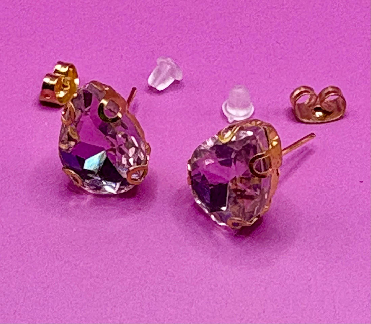 Stunning elegant light pink crystal earrings featuring a delicate design, perfect for special occasions and adding a touch of glamour to any outfit.