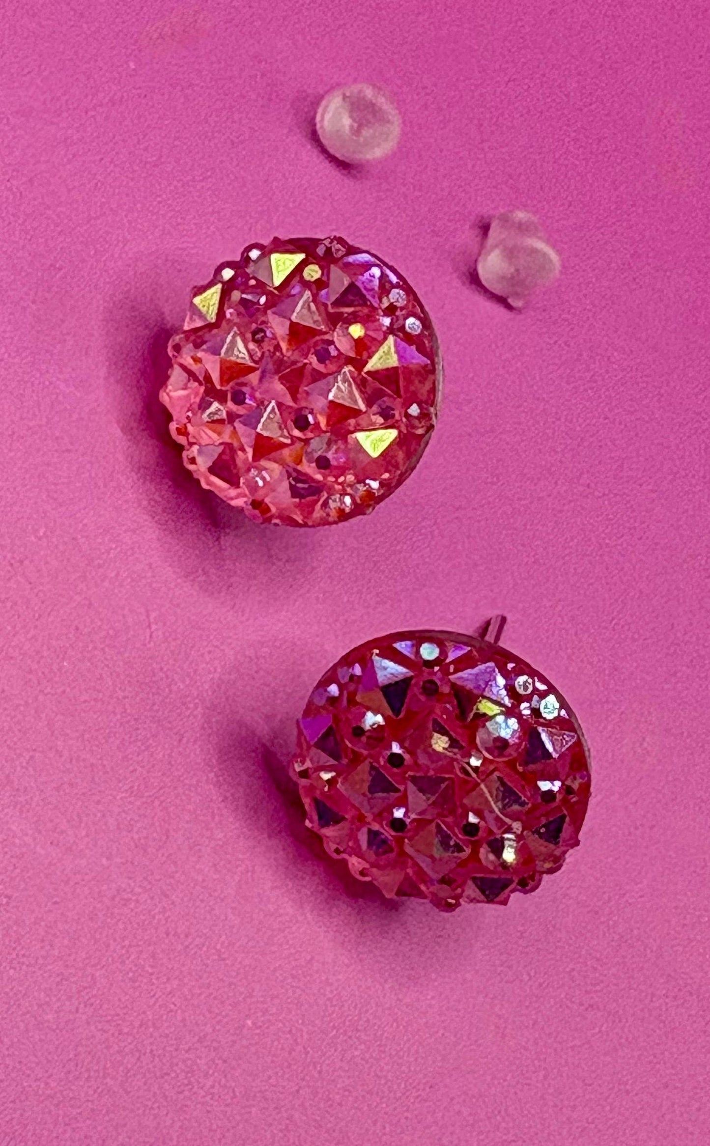 Elegant coral stud earrings featuring shimmering gemstones, ideal for enhancing your jewelry collection and complementing various outfits.