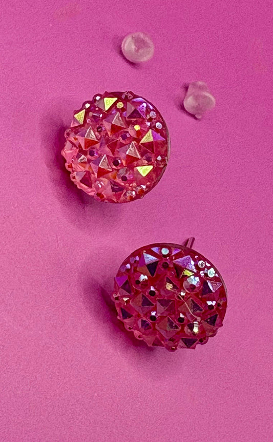 Elegant coral stud earrings featuring shimmering gemstones, ideal for enhancing your jewelry collection and complementing various outfits.