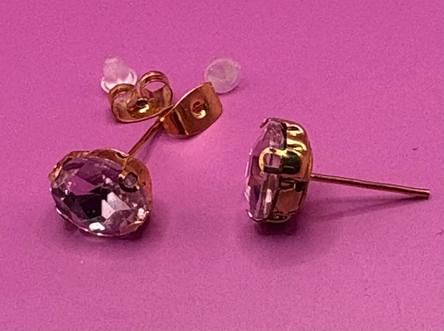 Elegant light pink crystal earrings designed with a beautiful sparkle, perfect for adding a touch of glamour to any outfit for weddings, parties, or everyday wear.