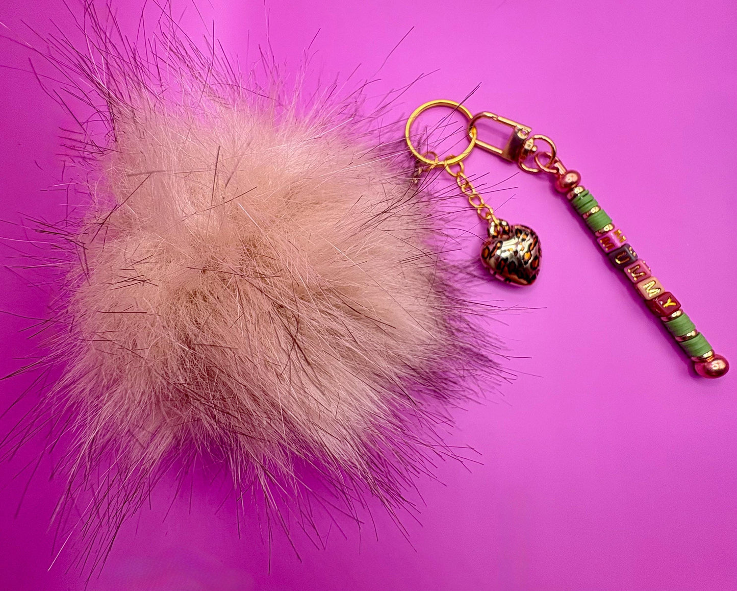 bag charm keychain mummy beads with gold leopard print heart pendant and fluffy ball