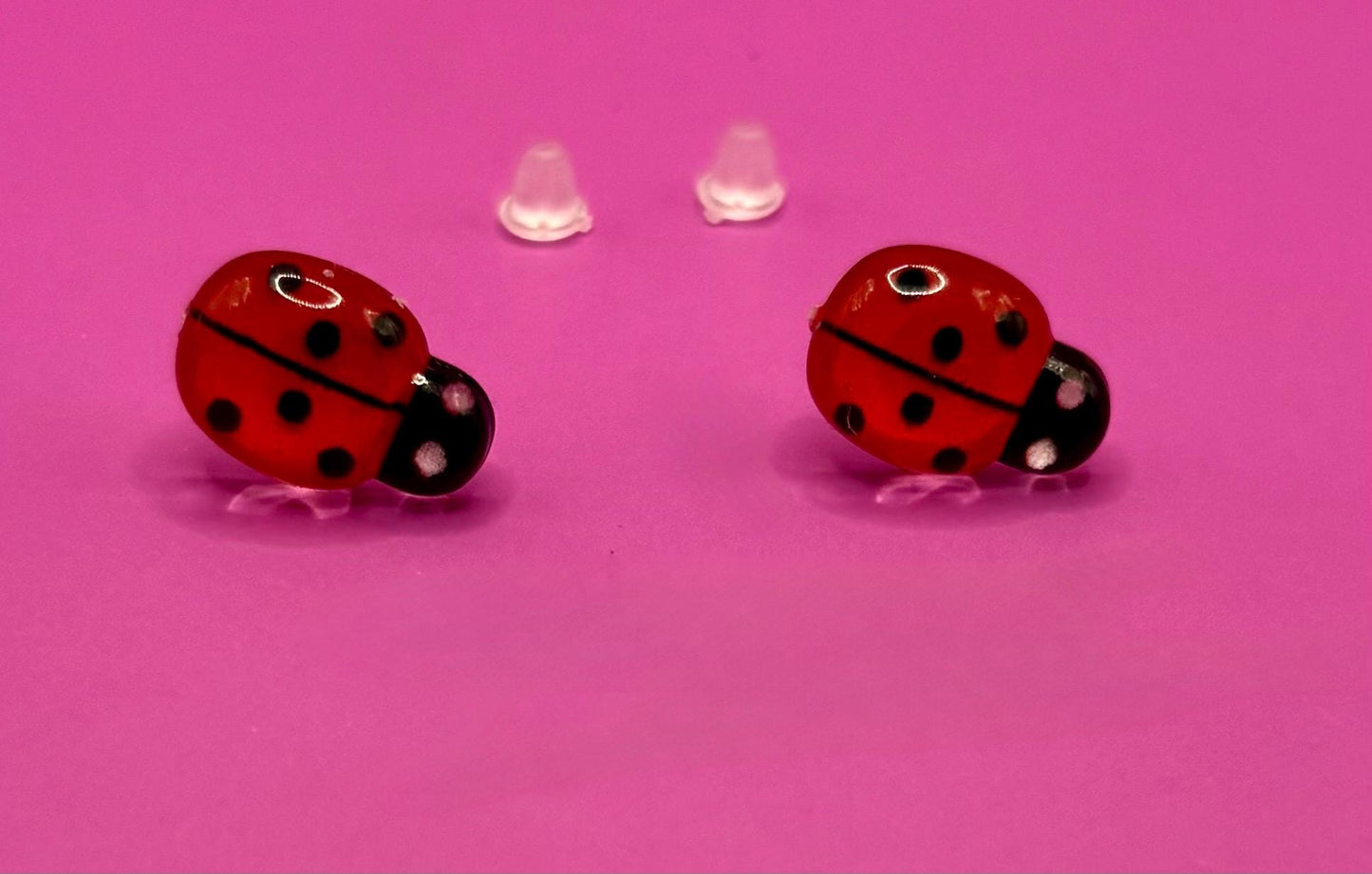 Whimsical red ladybug earrings with charming design, perfect for adding a playful touch to your outfit and ideal for nature lovers and casual wear.