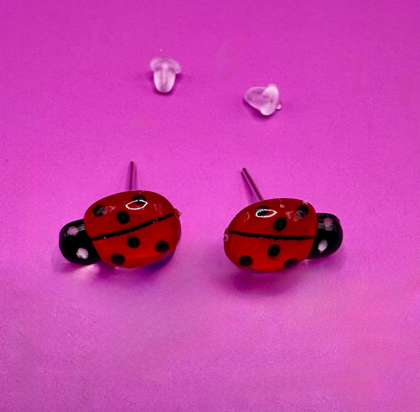 Whimsical red ladybug earrings with charming design, perfect for adding a playful touch to your outfit and ideal for nature lovers and casual wear.