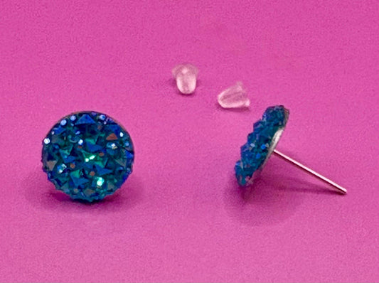Beautiful dazzling blue stud earrings with sparkling crystals, perfect for adding a pop of color and elegance to any outfit.