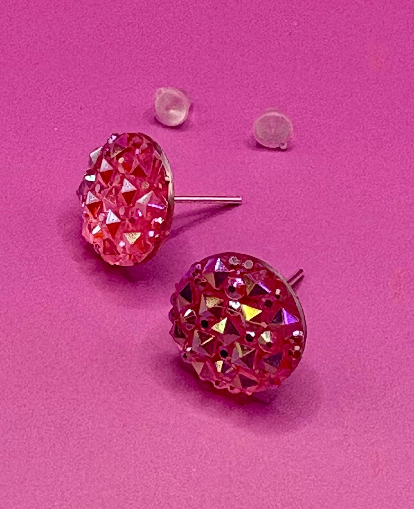 Elegant coral stud earrings featuring shimmering gemstones, ideal for enhancing your jewelry collection and complementing various outfits.
