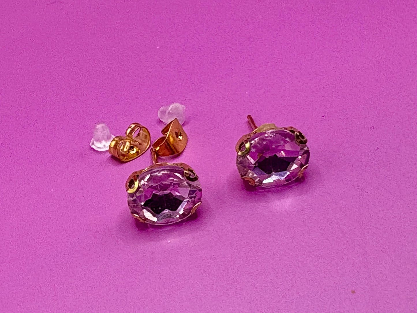 Elegant light pink crystal earrings designed with a beautiful sparkle, perfect for adding a touch of glamour to any outfit for weddings, parties, or everyday wear.