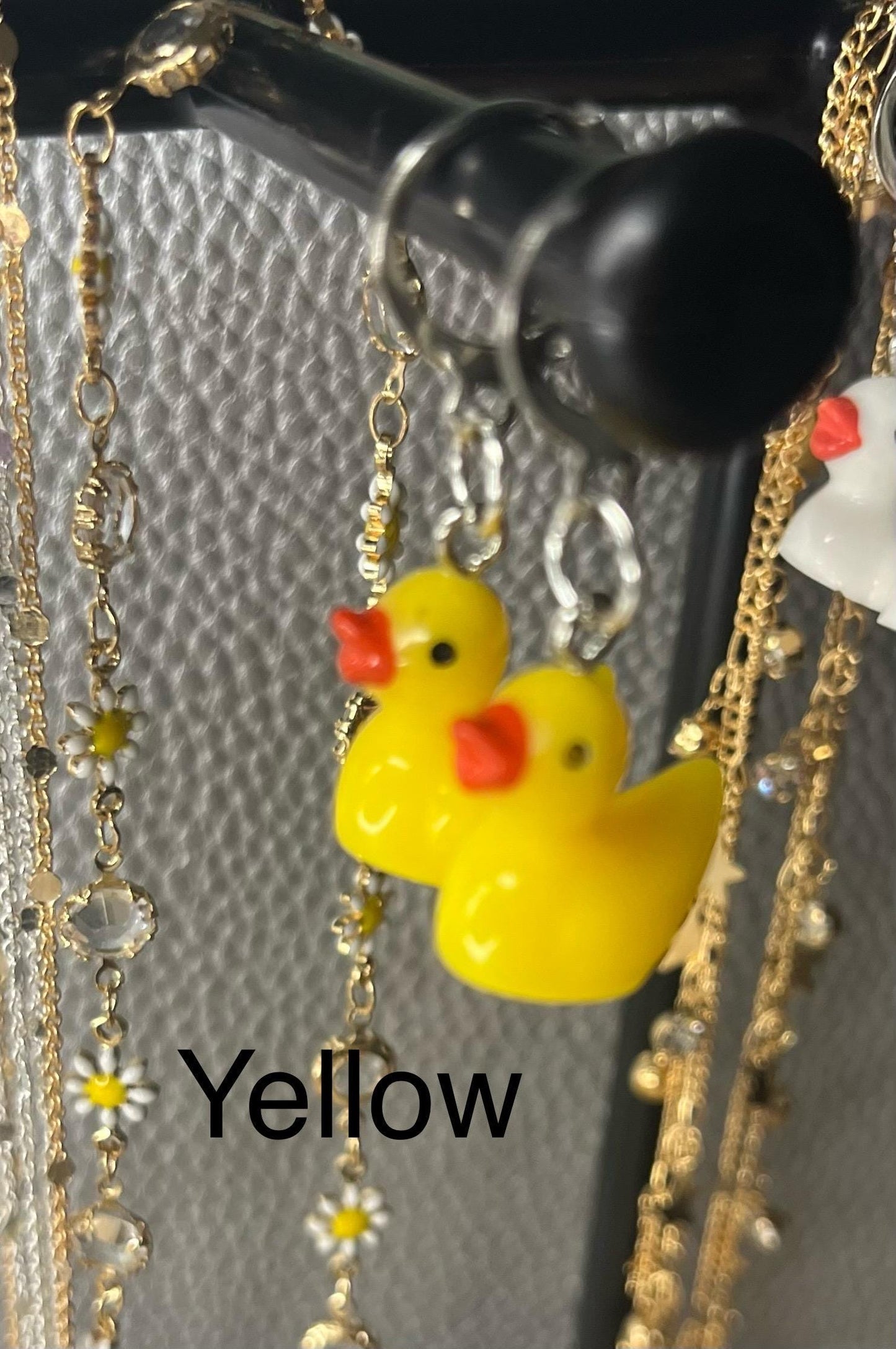 Cute little rubber duck style earrings, dangly drop earrings. available in multiple colours. pink blue yellow purple white costume jewellery