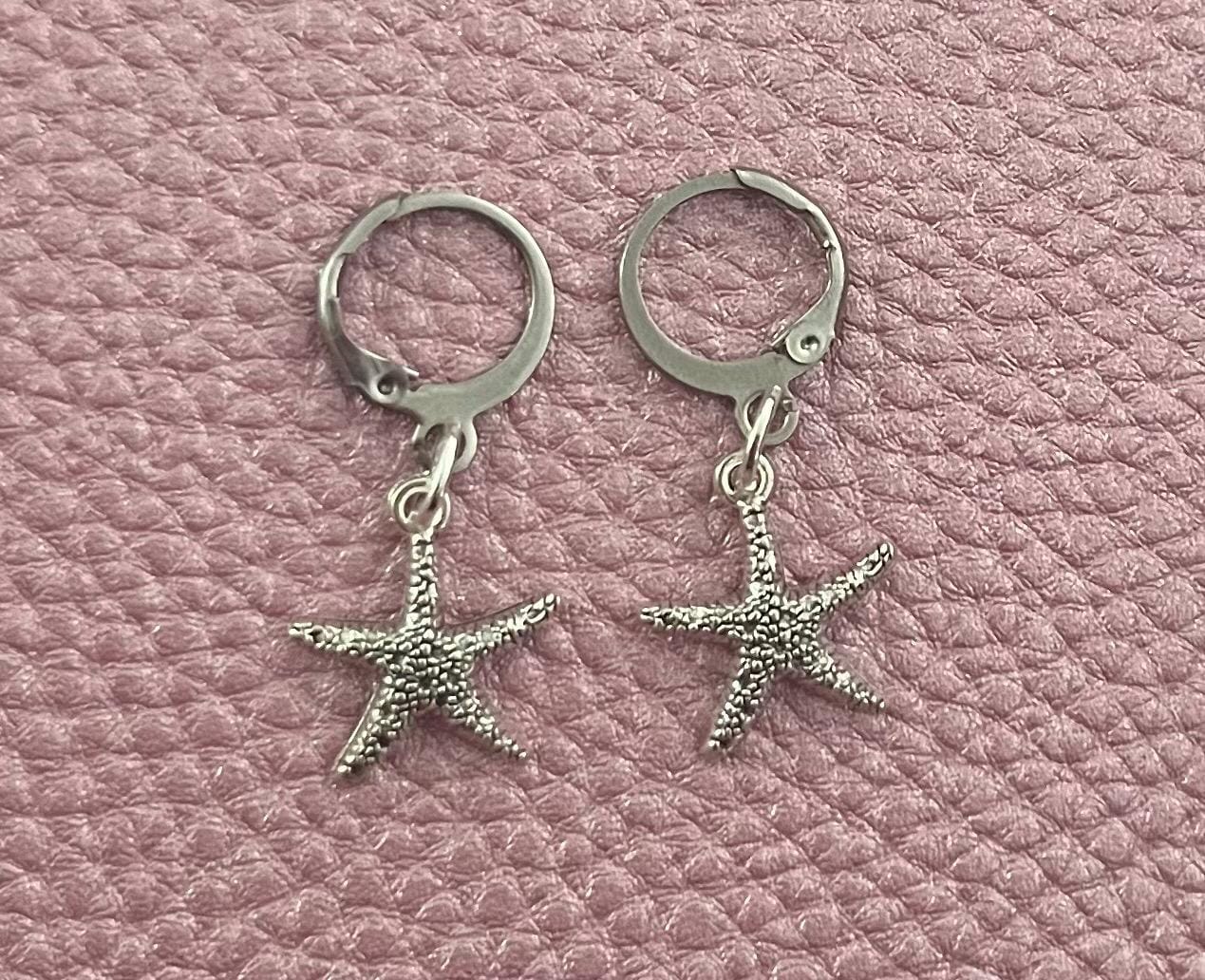 10 pairs of cute dangly earrings some mismatched starfish cats crowns seahorses clouds leaves fishtail gold silver costume jewellery