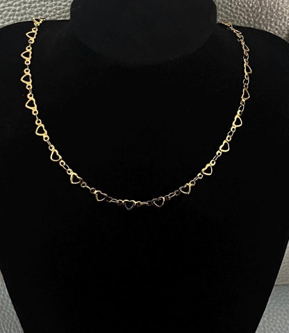 Gold Heart Short Chain Necklace, elegantly designed with a dainty heart pendant, perfect for layering or wearing alone for a stylish and romantic touch.