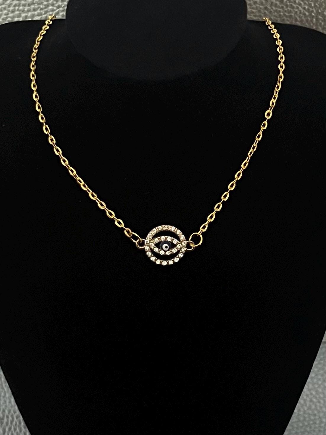 Circular diamanté evil eye necklace- colour gold