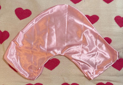 Handmade V-shaped pillowcase in a variety of stylish prints, crafted from soft polyester with a silk satin feel, designed to protect hair and enhance sleep comfort. Pillow not included.