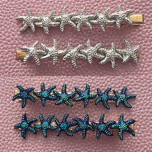 pair of eye catching starfish large 8cm hair clips/slides. available in blue or silver. handmade hair slides.