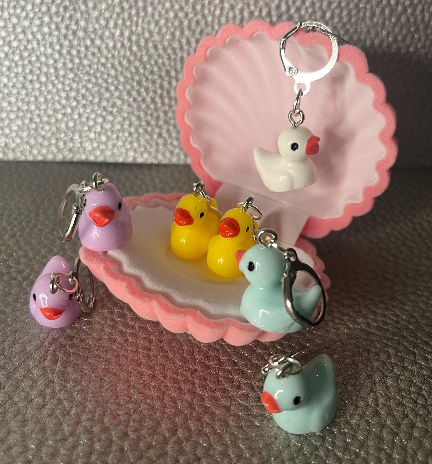 Cute little rubber duck style earrings, dangly drop earrings. available in multiple colours. pink blue yellow purple white costume jewellery