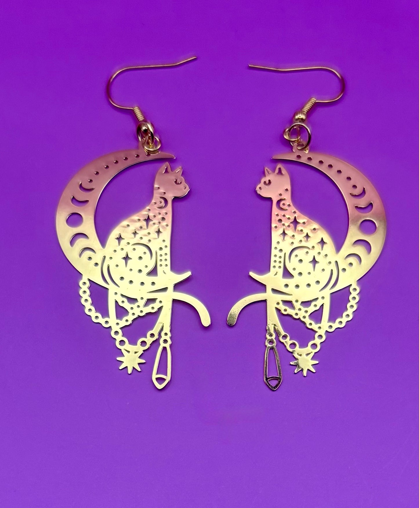 Charming cat on the moon earrings, featuring a whimsical design perfect for cat lovers, adding a playful touch to any outfit and ideal for casual or everyday wear.