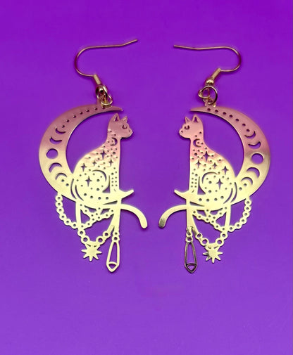 Charming cat on the moon earrings, featuring a whimsical design perfect for cat lovers, adding a playful touch to any outfit and ideal for casual or everyday wear.