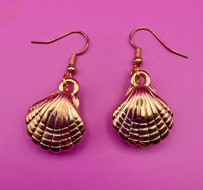 Stylish gold look seashell earrings, perfect for adding a touch of ocean-inspired elegance to your jewelry collection and enhancing any summer outfit.