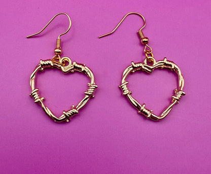 Stylish wire wrapped heart earrings, showcasing a unique design perfect for adding a romantic touch to any jewelry collection