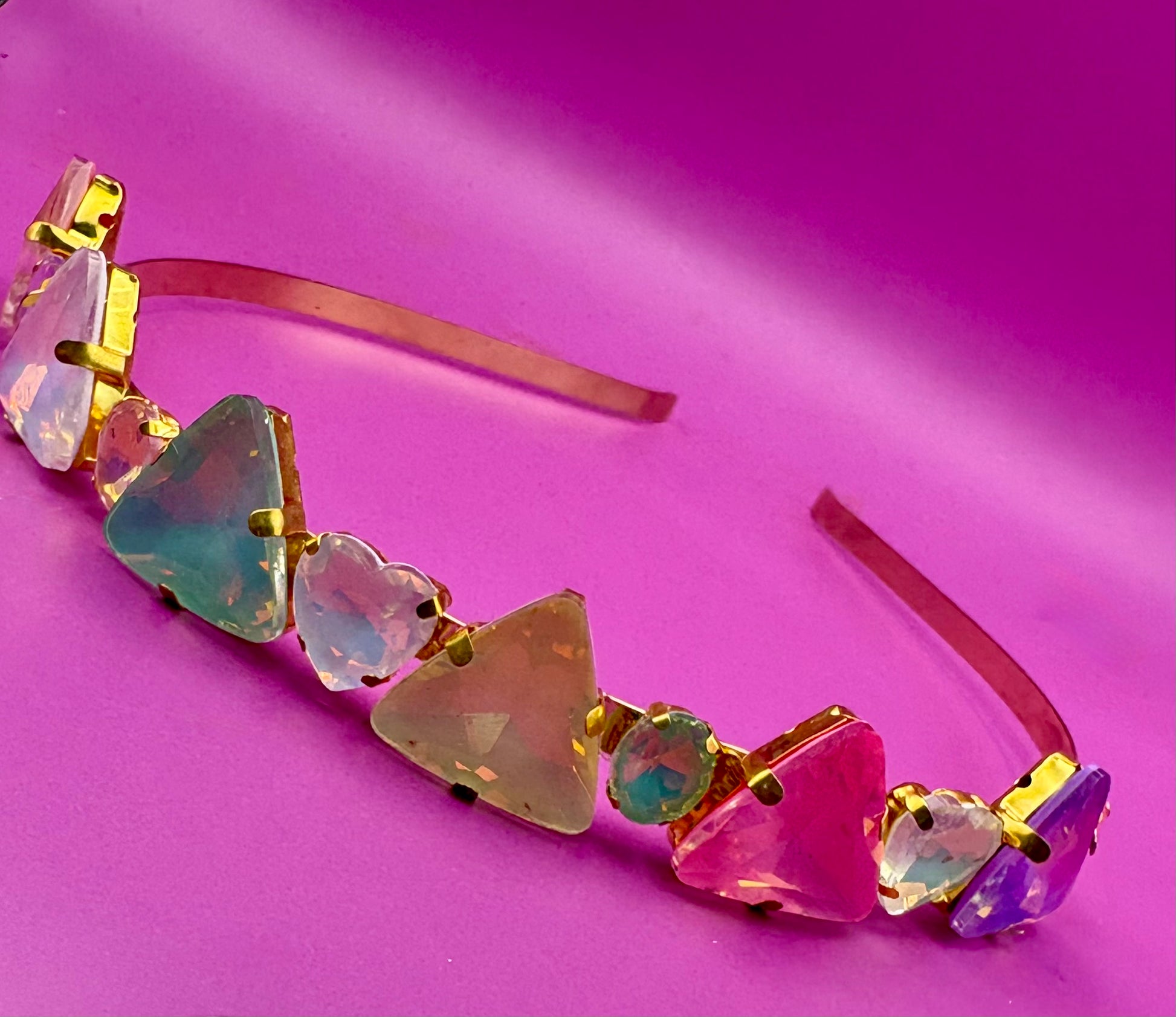 Elegant hand-decorated neon pastel headband featuring sparkling glass rhinestones, perfect for adding a touch of glamour to evening wear and special occasions.