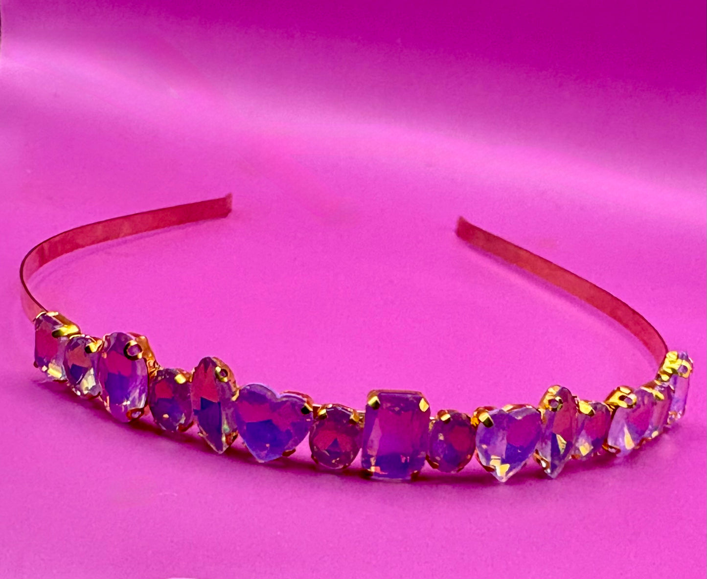 Elegant hand-decorated neon pastel headband featuring sparkling glass rhinestones, perfect for adding a touch of glamour to evening wear and special occasions.